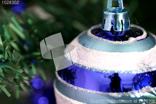Image of Christmas ornaments on tree.
