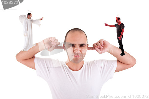 Image of man holding fingers in his ears, not listening, discussion between the devil and angel