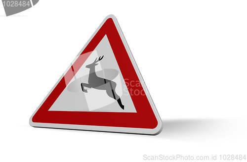 Image of attention deer crossing