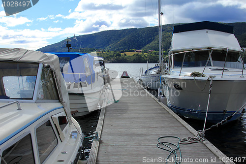 Image of Small boats by the marina.