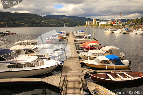 Image of Small boats by the marina.