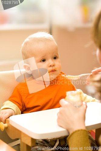 Image of Feeding a little baby boy