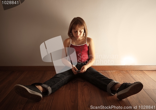 Image of Girl listening music