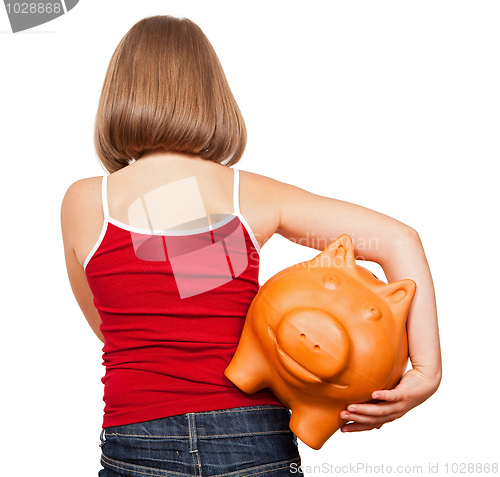 Image of Girl walking away with piggy bank