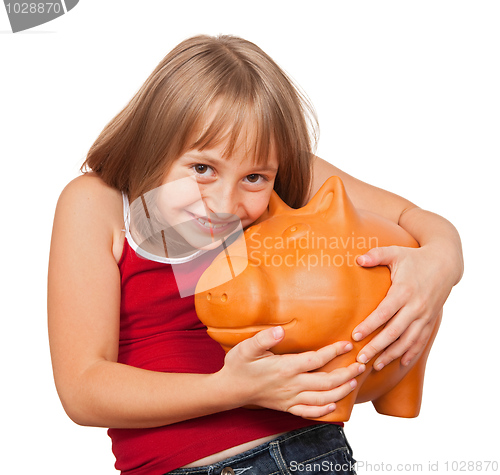 Image of Girl loving her piggy bank