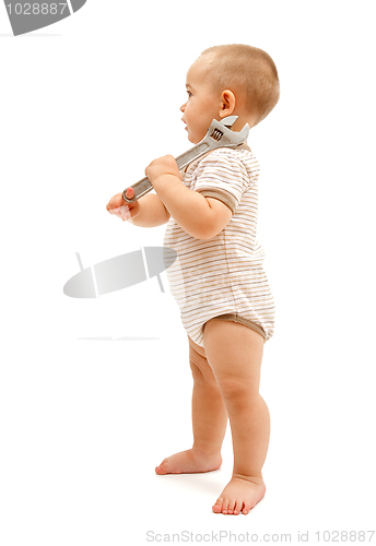 Image of Little boy with wrench