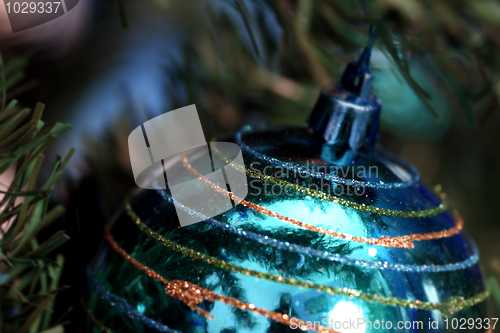 Image of Christmas ornaments on tree.