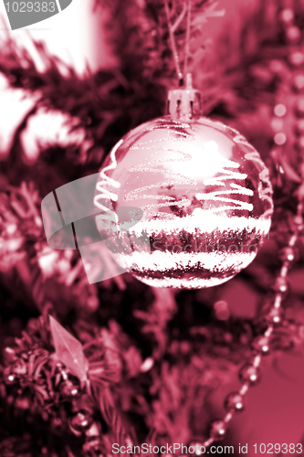 Image of Christmas ornaments on tree.