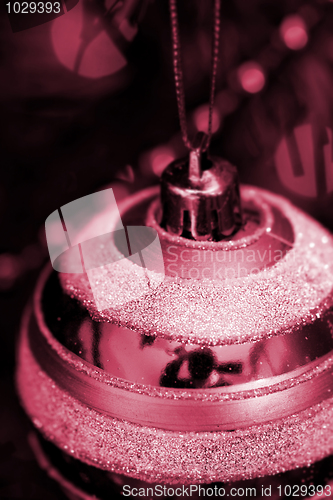 Image of Christmas ornaments on tree.