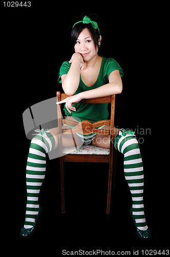 Image of Girl sitting in chair.