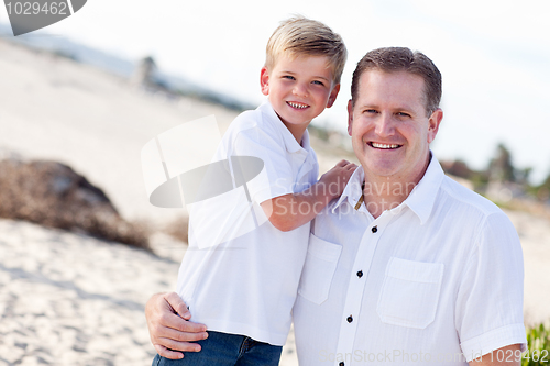 Image of Cute Son with His Handsome Dad at the Beach