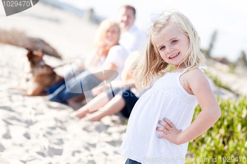 Image of Adorable Little Blonde Girl Having Fun At the Beach