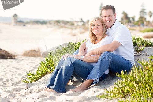 Image of Attractive Caucasian Couple Relaxing at the Beach