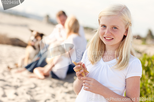 Image of Adorable Little Blonde Girl with Starfish