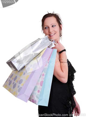 Image of young woman with shopping bags on white