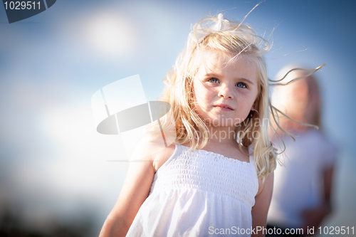 Image of Adorable Blue Eyed Girl Playing Outside