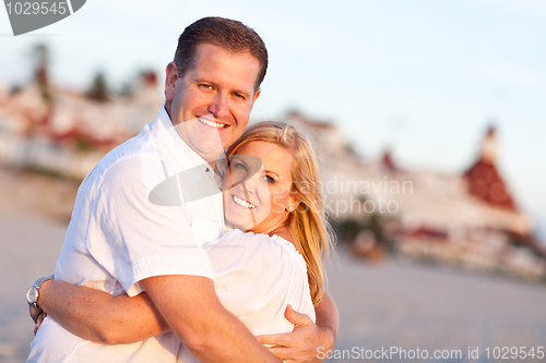 Image of Attractive Caucasian Couple Hugging at the Beach