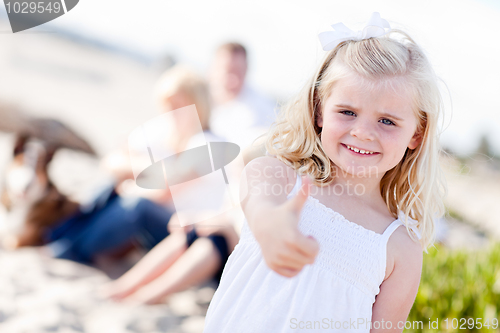 Image of Adorable Little Blonde Girl with Thumbs Up At the Beach