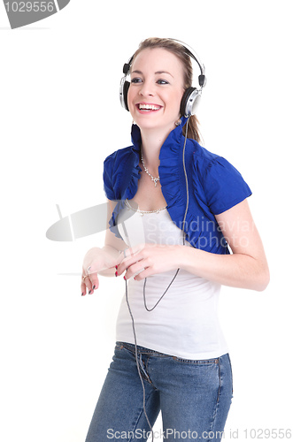 Image of young woman listening headphones