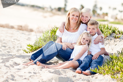Image of Attractive Mom and Her Cute Children at The Beach