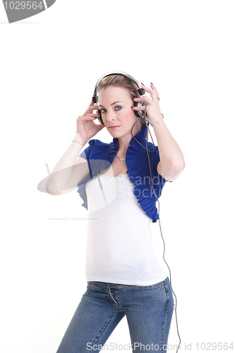 Image of young woman listening headphones