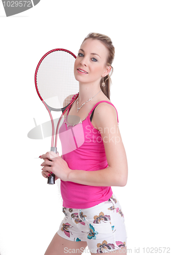 Image of pretty girl with tennis racket on white