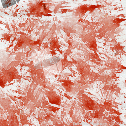 Image of red splashes on canvas