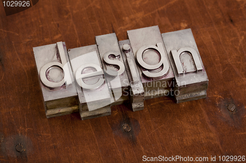 Image of design - word in metal type