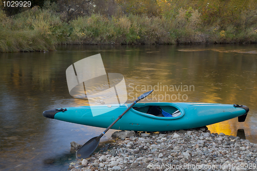 Image of blue whitewater kayak