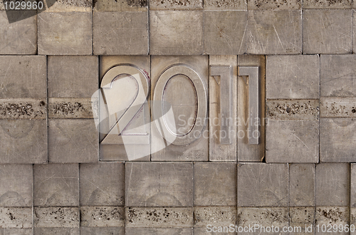 Image of 2011 - metal printing blocks background
