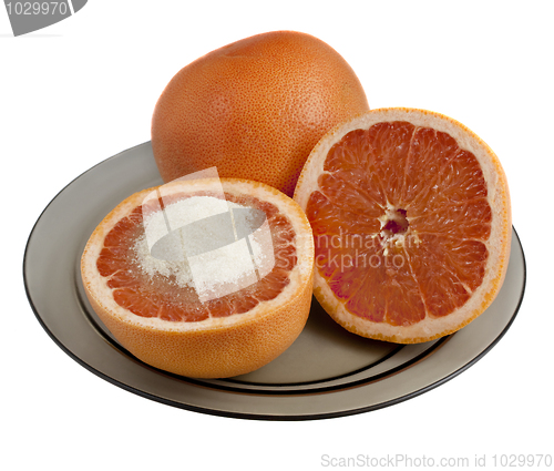 Image of grapefruit served with sugar
