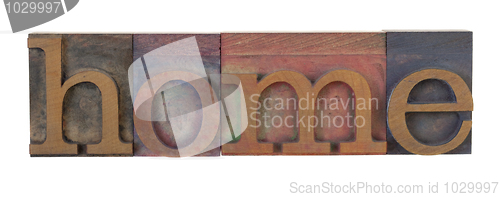 Image of home in wooden printing blocks