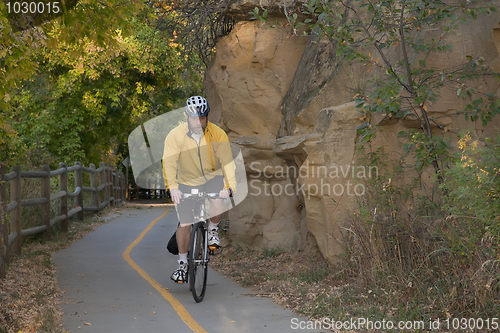 Image of riding a bike on scenic trail