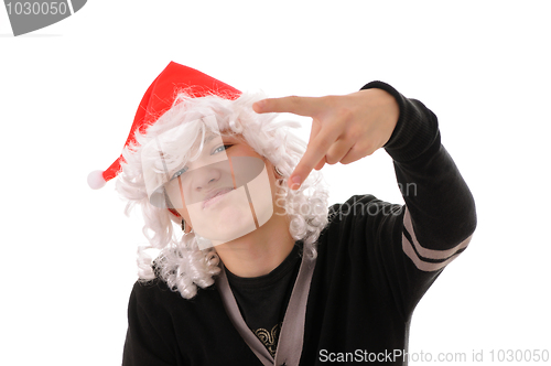 Image of teenager in  hat santa