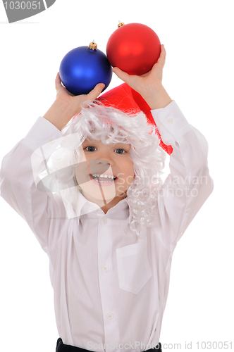 Image of child in a hat santa claus