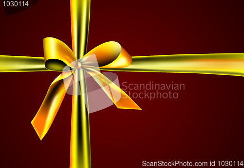 Image of gift with golden ribbon