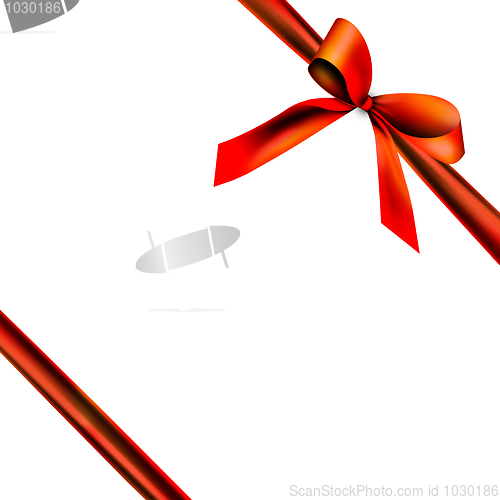 Image of gift packaging with red ribbon