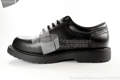 Image of Black leather shoe.