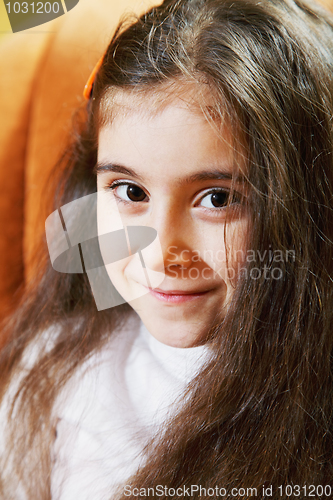 Image of Little brunette with long hair