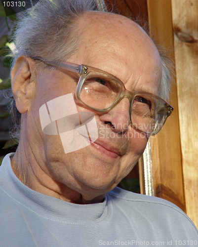 Image of Smiling older man outdoor