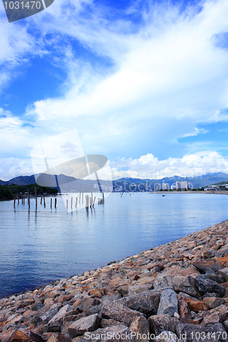 Image of Blue lake idill under cloudline sky 