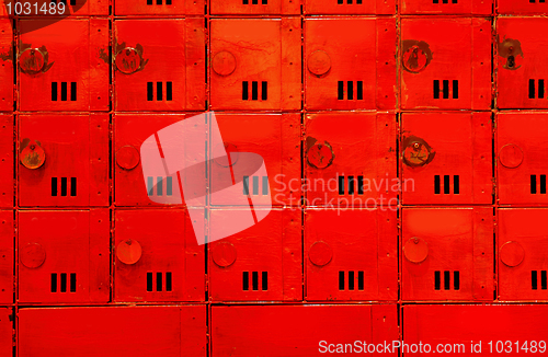 Image of aged mailboxes spain condominium wooden wall rusty brass