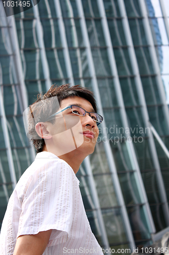 Image of asian young, handsome business man at the office building 