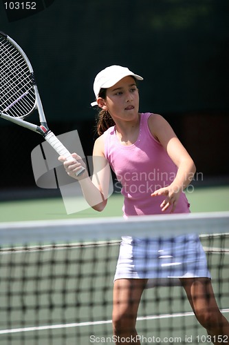 Image of Girl playing tennis