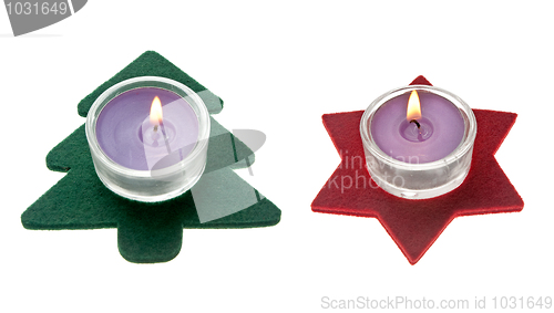 Image of Red star and green pine tree  Christmas decorations with candles