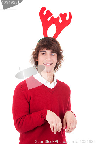 Image of happy young man wearing reindeer horns