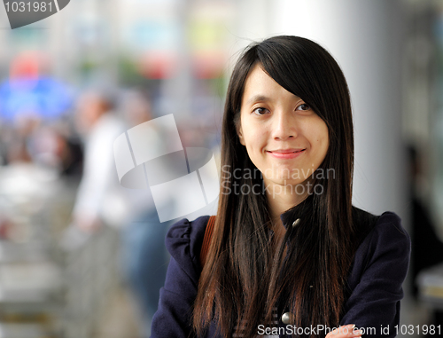 Image of woman in casual wear in city