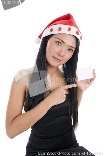 Image of woman with santa claus hat and blank business card