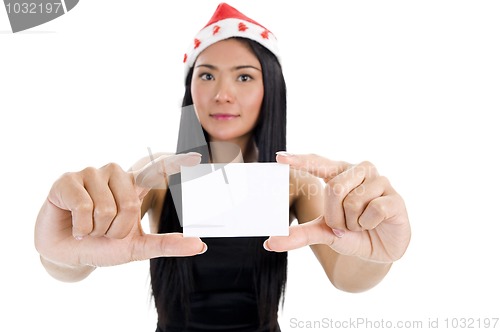 Image of woman with santa claus hat and blank business card