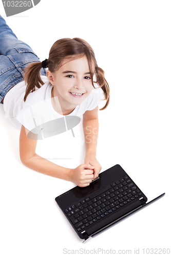 Image of Little student girl with a laptop
